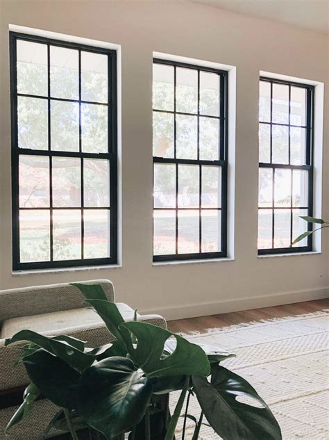 black metal frame house windows|exterior windows trimmed in black.